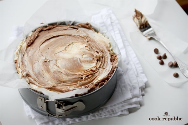 Swirling cake batter with a fork to get the marble effect