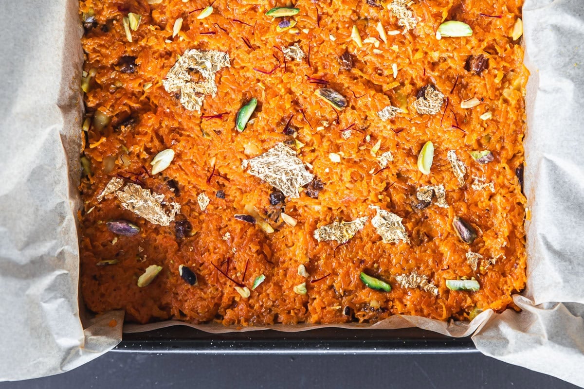 Gajar ka halwa - Carrot halwa or pudding in a square tin.