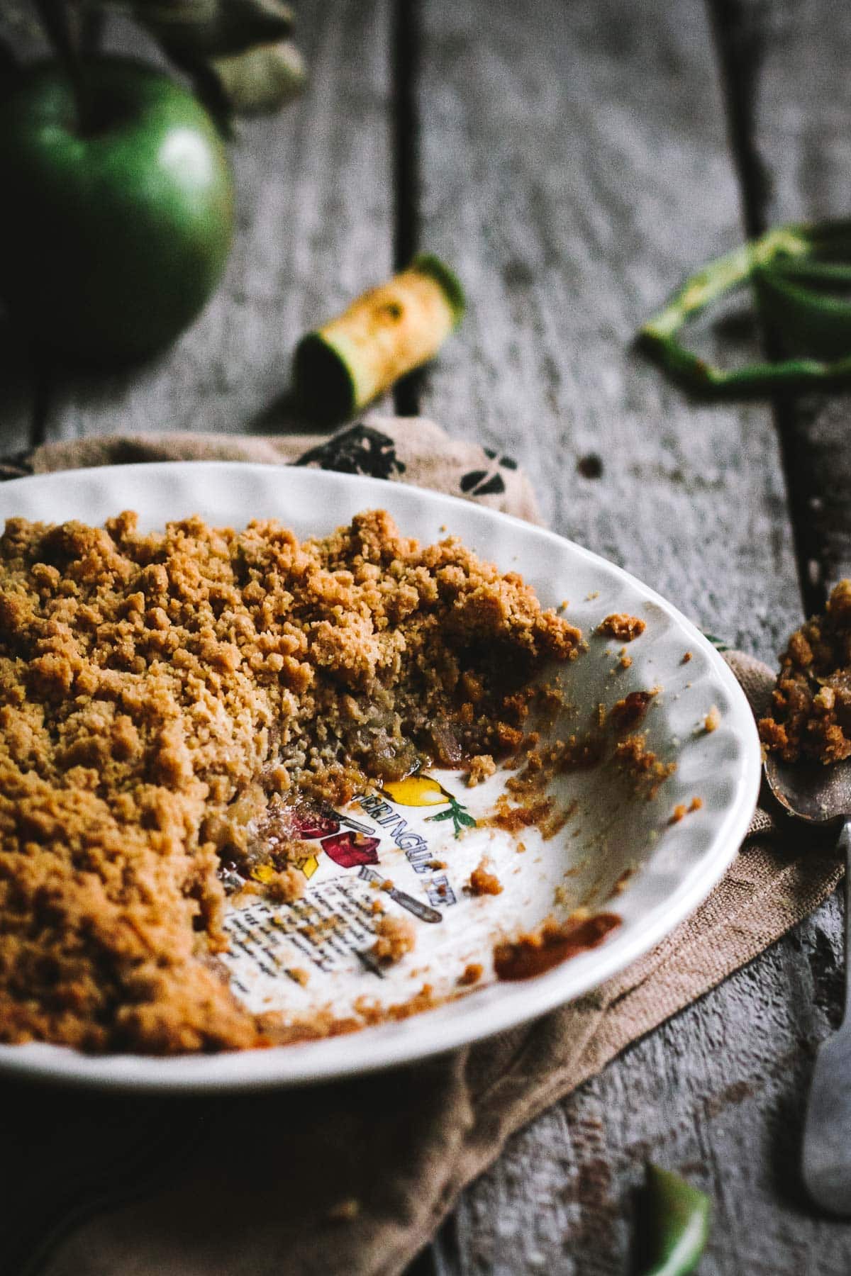 Apple crumble baked in a pie dish.