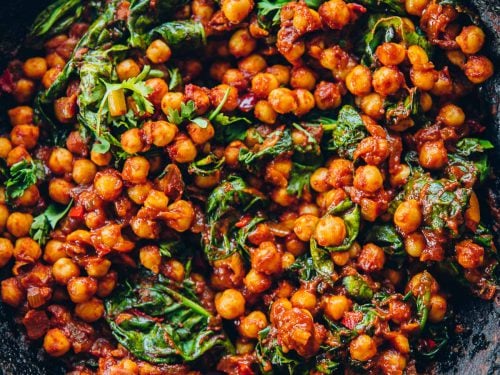 Spicy Moroccan Chickpeas With Spinach in a pan.