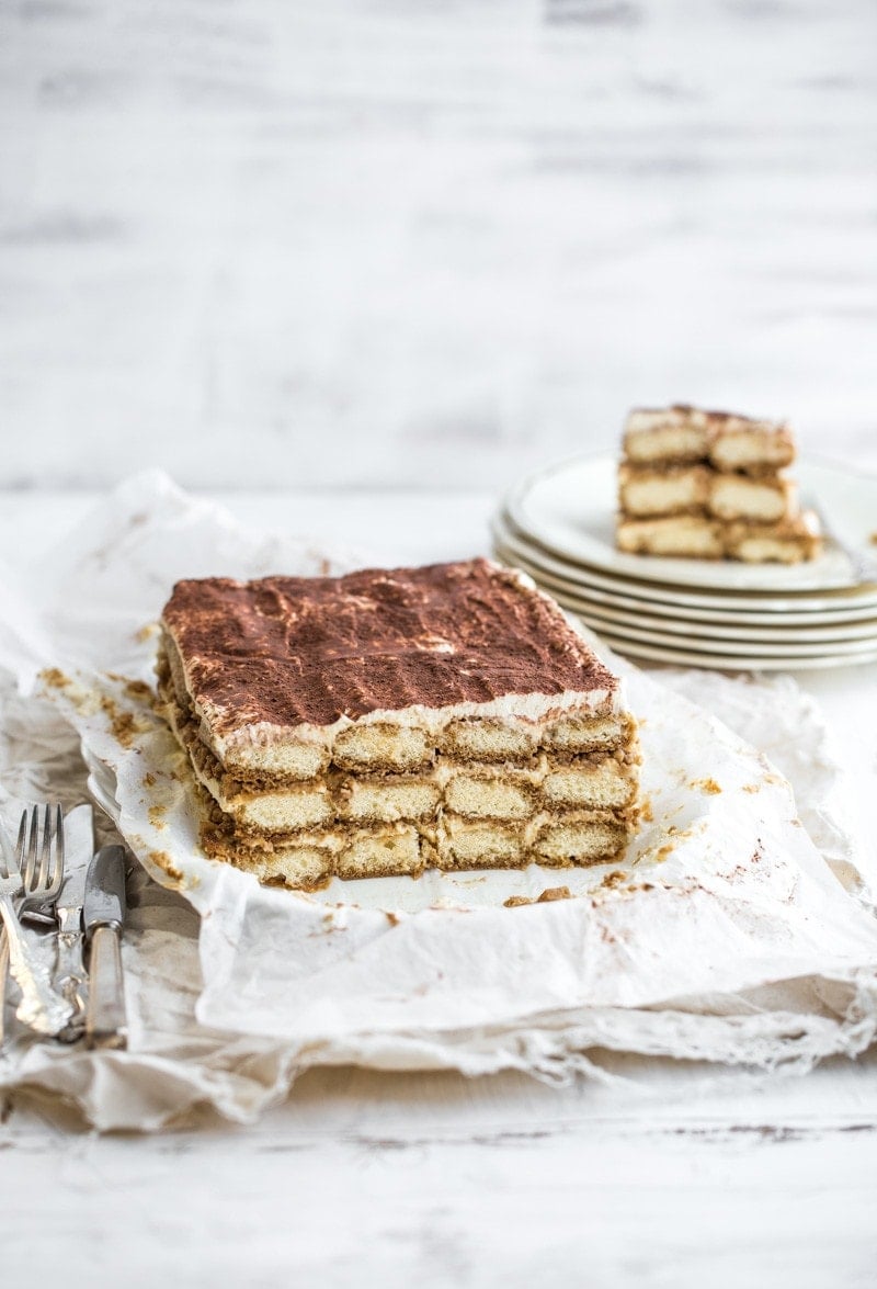 Gingerbread Tiramisu served with plates and cutlery.