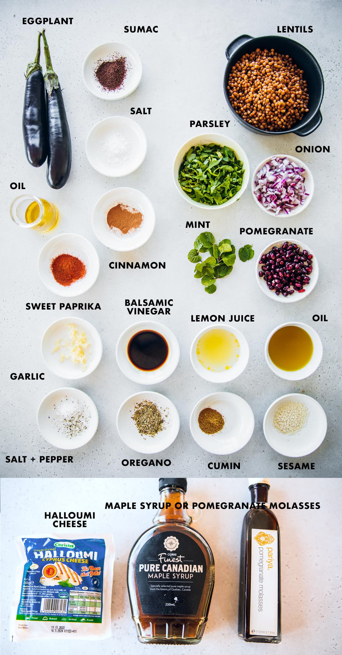 Halloumi Lentil Roasted Eggplant Salad ingredients measured and labeled - eggplant, onion, pomegranate, parsley, mint, lentils, sumac, paprika, cinnamon, garlic, oregano, cumin, lemon, balsamic vinegar, sesame, olive oil, salt, pepper and pomegranate molasses.