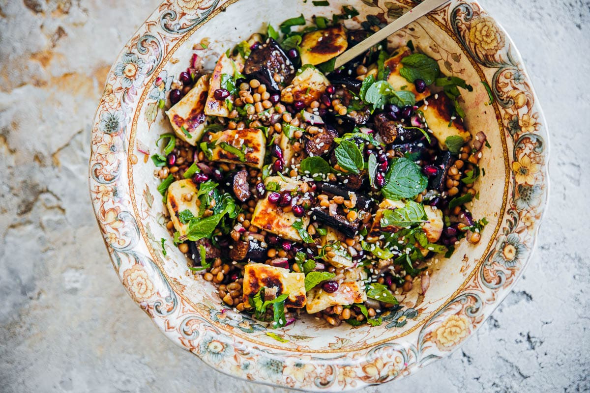 Halloumi, Lentil And Roasted Eggplant Salad in a floral vintage bowl.