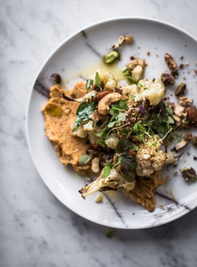 Slow Roasted Cauliflower Salad With Sweet Potato Hummus And Nut Dukkah