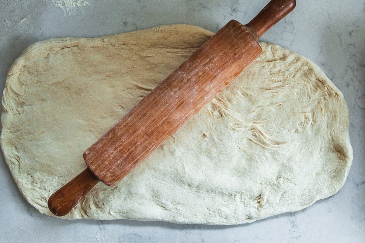 Roll the dough for the grandma pie.