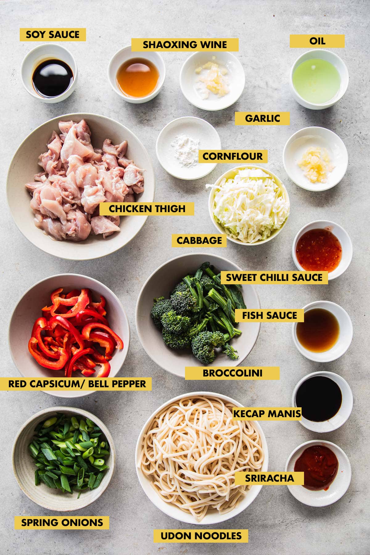 Chicken Udon Noodles Ingredients measured out in bowls and labeled.