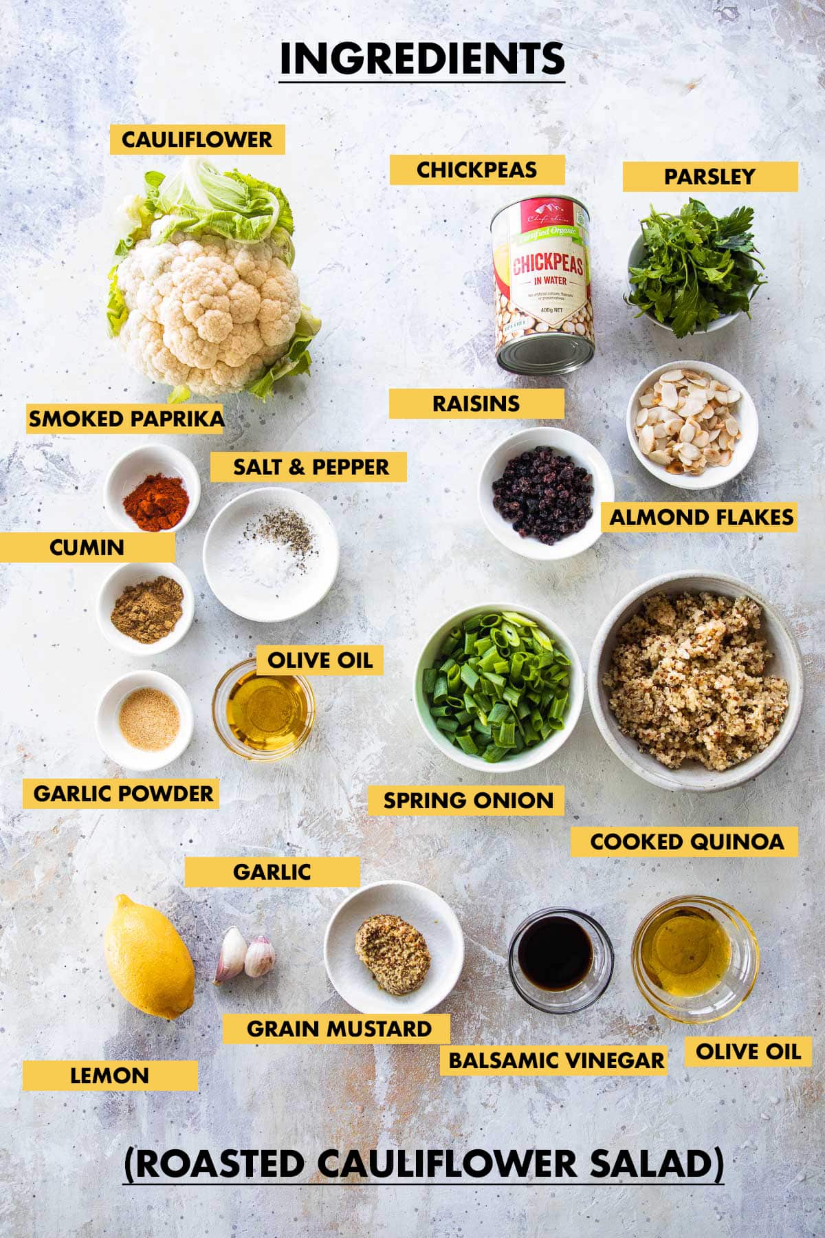 Ingredients for Roasted Cauliflower Salad measured, laid out in bowls and labeled.