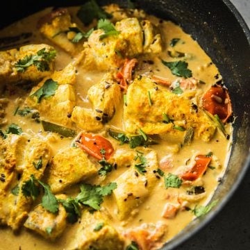 Golden yellow Sri Lankan Fish Curry with Barramundi fish.