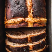 Hot Cross Bun Loaf slices in a baking tin.