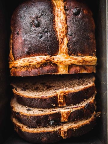 Hot Cross Bun Loaf slices in a baking tin.