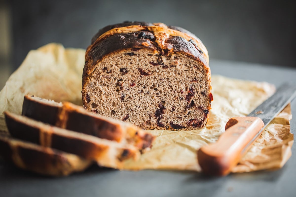 A sliced hot cross bun loaf.