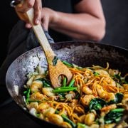 Prawn Hokkien Noodles being stir-fried in a wok.