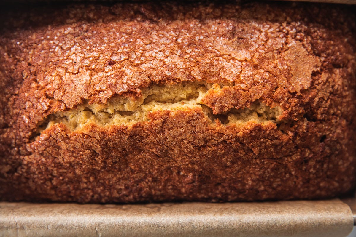 Orange Pound Cake freshly baked with a crack on top.