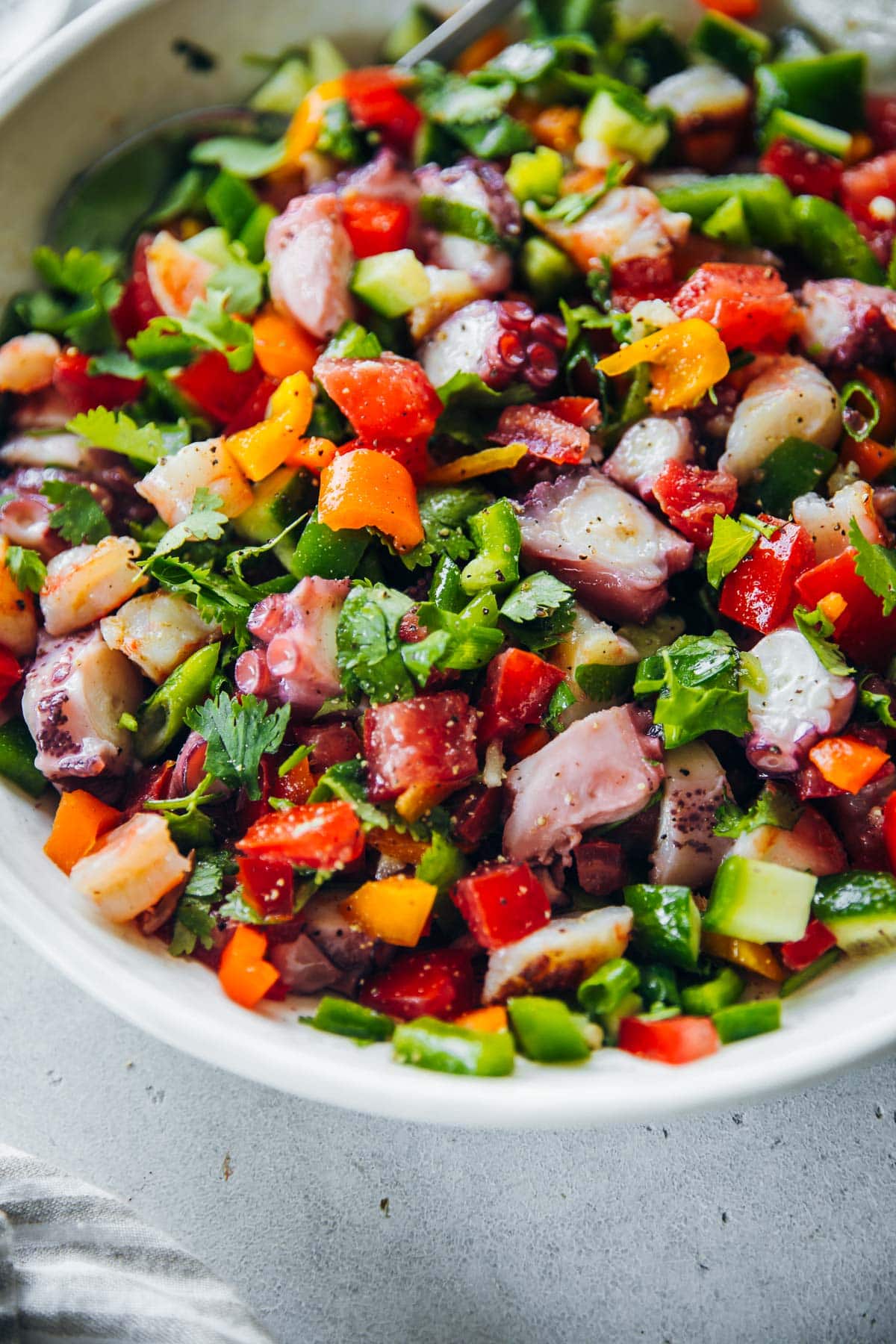 Seafood Pipiranna, a traditional Spanish Summer Salad served in a bowl.