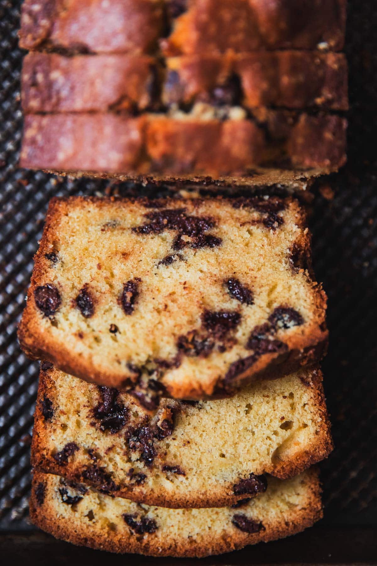 Chocolate Chip Pound Cake slices on a tray.