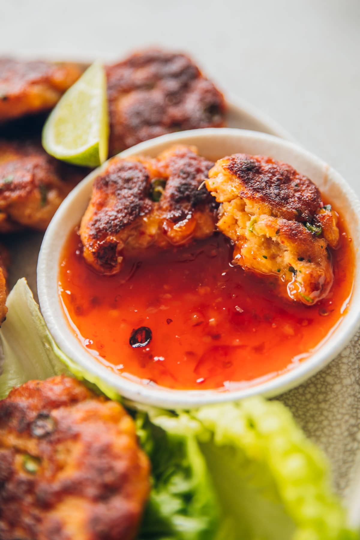 Thai Fish Cakes dipped in sweet chilli sauce.