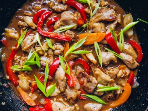 Chinese Satay Chicken Stir Fry in a wok.