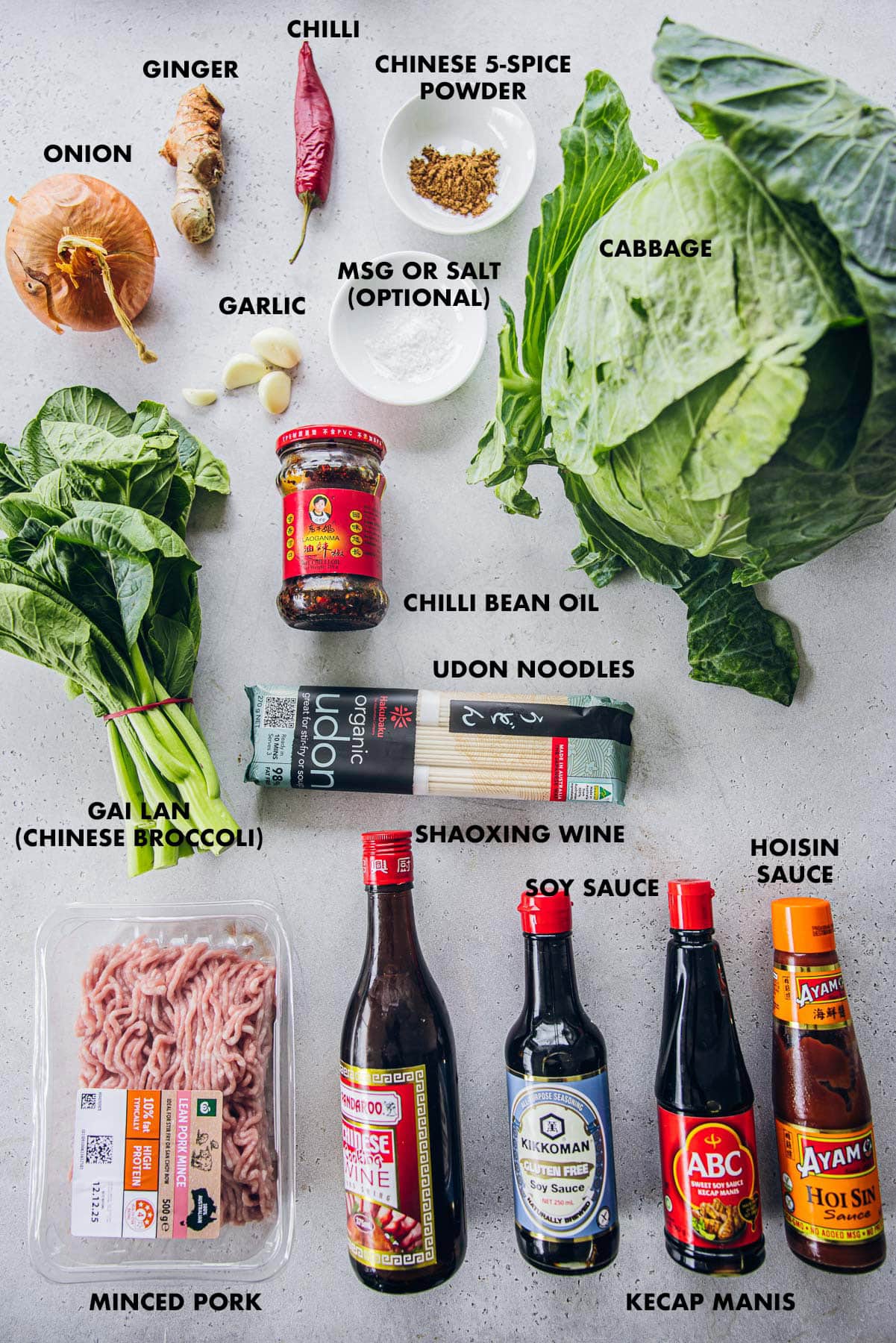 Ingredients for Minced Pork Noodles - Onion, cabbage, gai lan, ginger, garlic, red chilli, udon noodles, minced pork, chilli bean oil, Shaoxing wine, Kecap Manis, Soy Sauce, Hoisin Sauce, Chinese 5-Spice Powder and optional MSG.