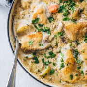 Creamy Chicken Casserole in a pan with a serving spoon.
