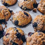 Buttermilk Blueberry Muffins in a muffin tin.